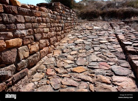 Road and brick wall of ancient city-Ruins of Harappa civilisation ...