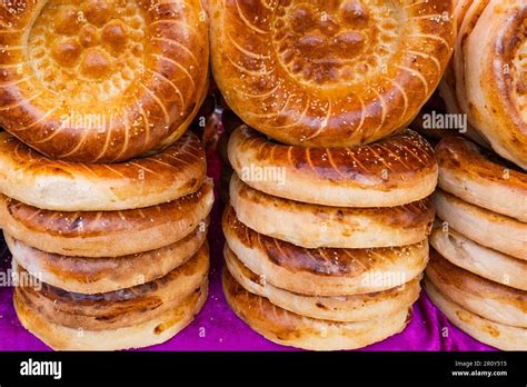 Tandoor naan or tandoor bread sold at the market in Kyrgyzstan Stock ...