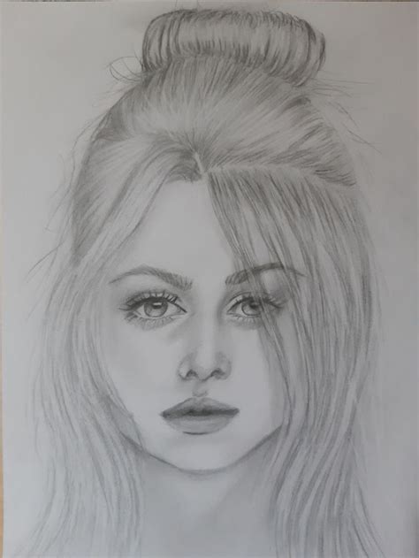 A Pencil Drawing Of A Woman S Face