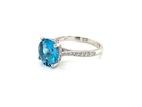 Round Swiss Blue Topaz And Cubic Zirconia Rhodium Over Sterling Silver