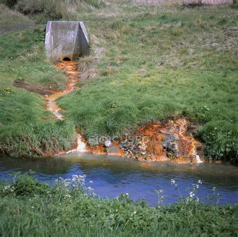 Chemically Polluted Water Draining Into River Tame Out Of Land With