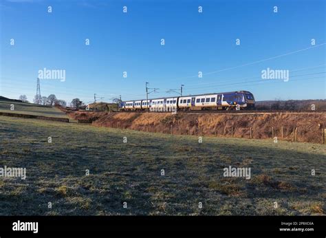 Northern Rail Caf Class 195 Diesel Multiple Unit Train On The West Coast Mainline Passing The