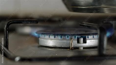 Close Up View Of Turning On Gas Stove Spark Ignites Fire Man Turn Gas