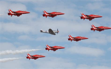 The Red Arrows Royal Air Force Aerobatic Team Are Joined By A