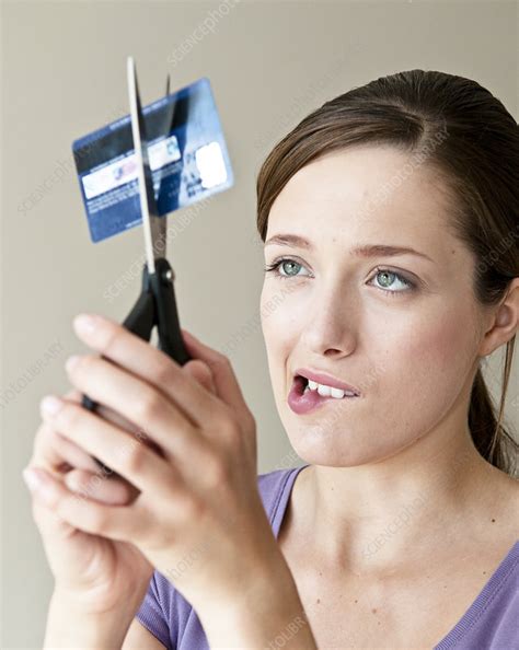 Woman Cutting Up Credit Card Stock Image F005 1642 Science Photo