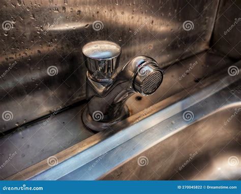 A Faucet at the Sink that Has Just Been Used for Handwashing Stock ...