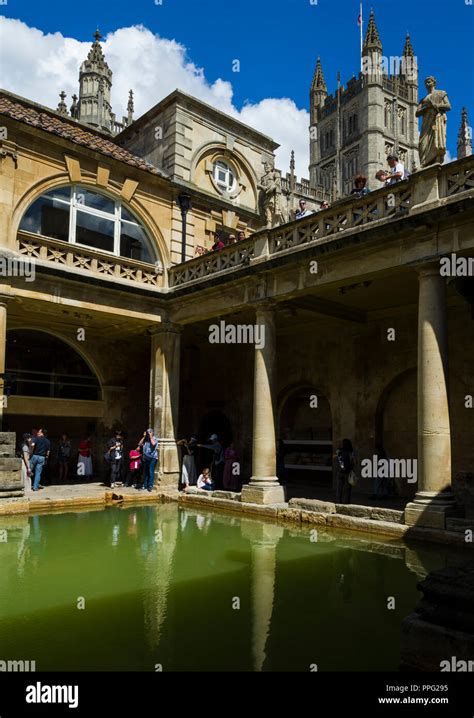 Visitors Exploring The Historic Roman Baths Bath Somerset England