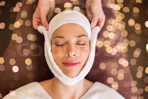 Woman Having Face Massage With Towel At Spa Stock Image Colourbox