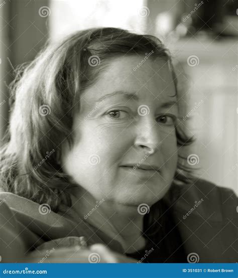 Attractive Middle-Aged Woman Stock Image - Image of woman, daydream: 351031