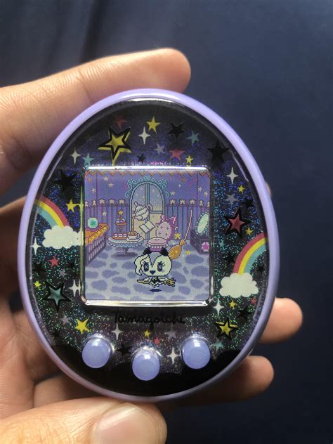 Hi I was feeding my tamagotchi and then she changed color, what ...