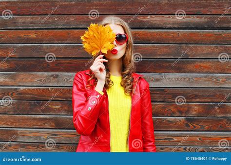 Portrait Pretty Young Woman With Autumn Yellow Maple Leafs Wearing A