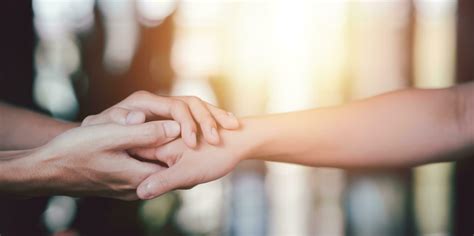 Husband And Wife Join Hands To Cheer Relationship Care Concept