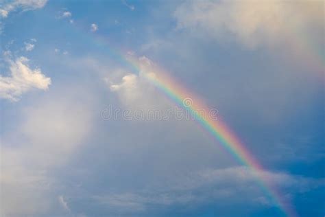 Rainbow Over Cloudy Sky after Raining Stock Photo - Image of overcast ...