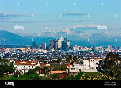 Los Angeles with snowy mountains in the background Stock Photo - Alamy