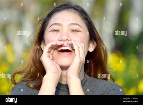 Pretty Filipina Woman Shouting Stock Photo Alamy