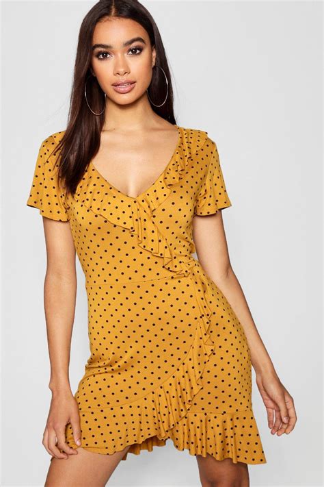 Lyst Boohoo Polka Dot Wrap Front Ruffle Tea Dress In Yellow