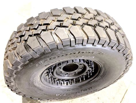 BF Goodrich Baja T A 37X12 50R16 5LT Radial Tire Mounted On 24 Bolt Rim