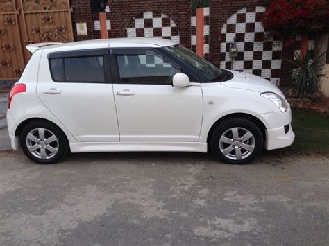 F.S modified Suzuki Swift dlx (white) 2013 - Cars - PakWheels Forums