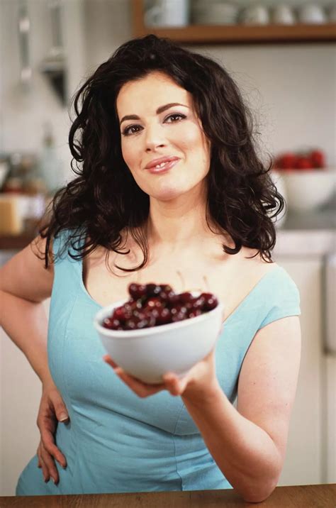Nigella Lawson's sexiest moments - plunging gown, red-hot display and