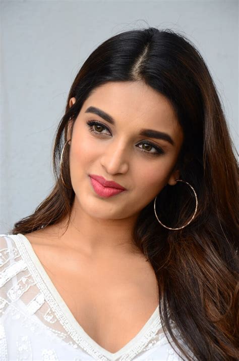 Bollywood Babe Nidhhi Agerwal Stills In White Dress