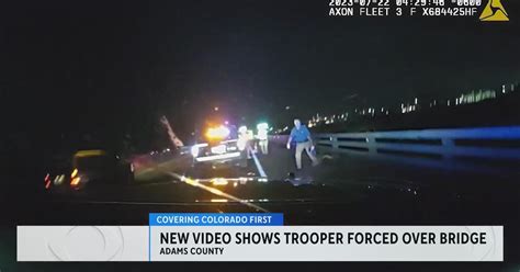 Trooper Falls Over 30 Feet From Elevated Roadway To River Bank While Trying To Escape Crash