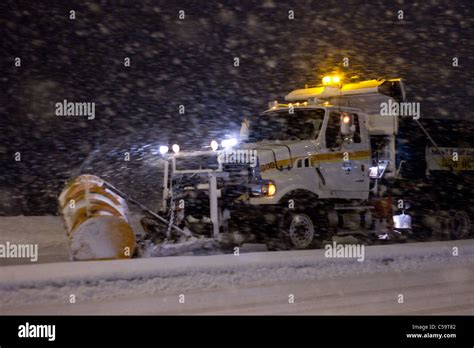 Snow Plow During Snow Storm Stock Photo - Alamy