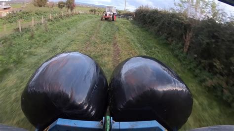 October Baling And Stacking Of Round Bales Youtube