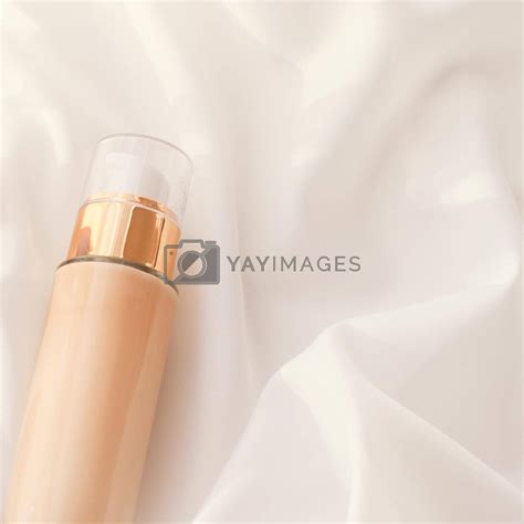 Tonal Bb Cream Bottle Make Up Fluid Foundation Base For Nude Skin Color On Silk Background
