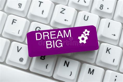 Sign Displaying Dream Big Word Written On To Think Of Something High