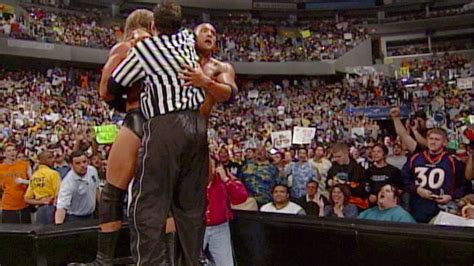 The Rock Gives A Double Rock Bottom To Triple H And Shane McMahon