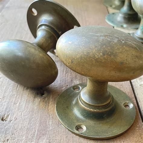 A Set Of Fifteen Pairs Of Victorian Brass Oval Door Knobs Lassco