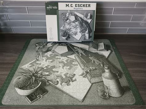 Reptiles by M.C. Escher - 1000 pieces - Pomegranate : r/Jigsawpuzzles