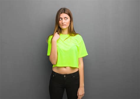 premium photo young cool russian girl thinking   idea