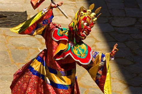 Masked Dancers Performing The Dance Of The Terrifying Deities At The Paro Tsechu Festival