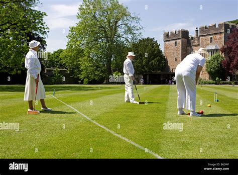 England Somerset Wells A Game Of Croquet Takes Place On The Lawns In