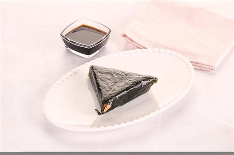 Premium Photo Japanese Traditional Onigiri With Fish