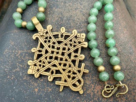 Vintage Brass Ethiopian Cross Pendant And Green Aventurine Bead