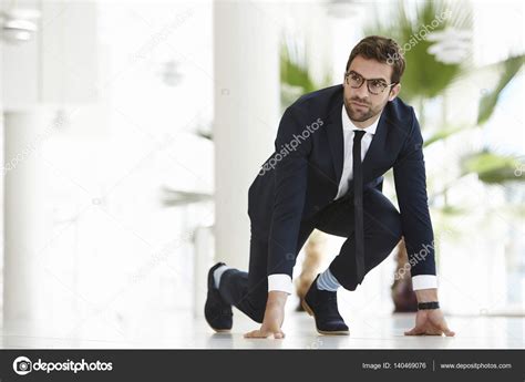 Businessman Ready To Run Stock Photo Sanneberg