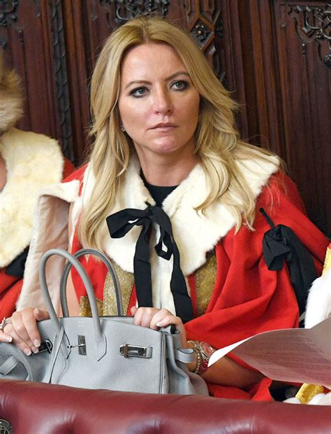 Michelle Mone: Baroness rapped for displaying boobs in Parliament ...