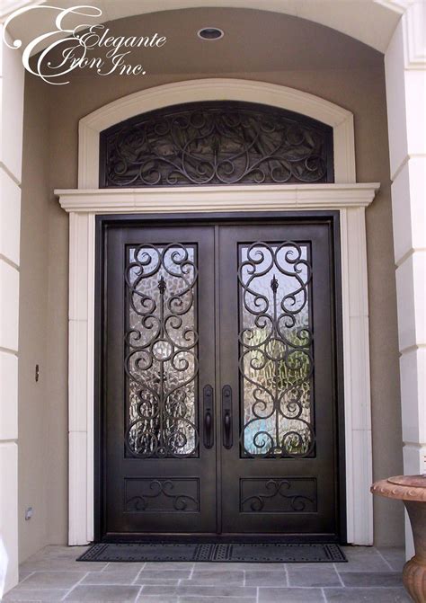 Custom Wrought Iron Door With Eyebrow Arch Transom Iron Doors Wrought Iron Doors Front