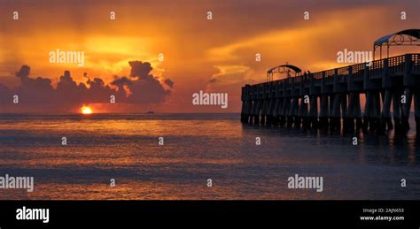 Sunrise from the Pier at Lake Worth Beach, Florida Stock Photo - Alamy