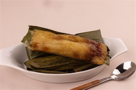 Premium Photo Suman Cassava Is A Filipino Dessert Made From Grated