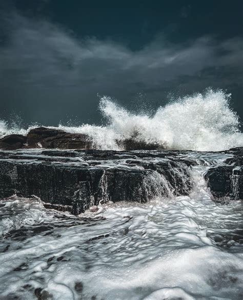 Splashing Sea Waves under Storm Clouds · Free Stock Photo