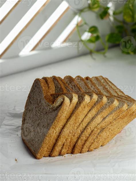 Sliced loaf of wheat bread, Detailed close-up 10717556 Stock Photo at Vecteezy