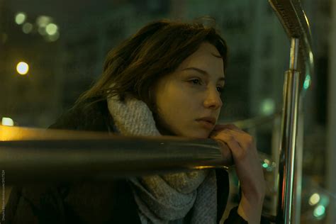 Portrait Of A Beautiful Girl On The Railing Of The Underpass By Stocksy Contributor Demetr