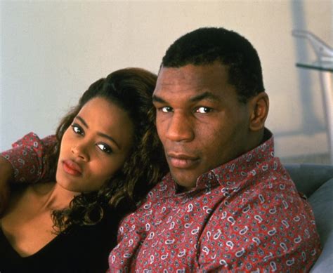 Portrait of American actress Robin Givens and her husband, heavyweight ...