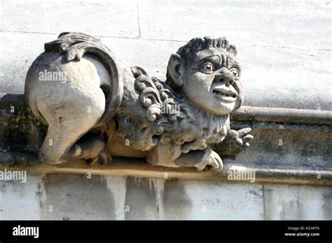 Stone gargoyle with funny face Stock Photo - Alamy