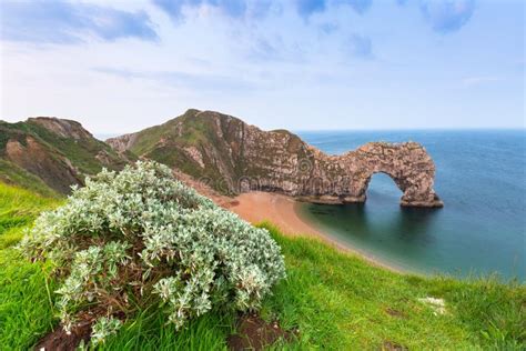 Durdle Door At The Beach On The Jurassic Coast Of Dorset Stock Photo