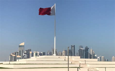 FILE PHOTO: The Qatari flag is seen at a park near Doha Corniche, in ...