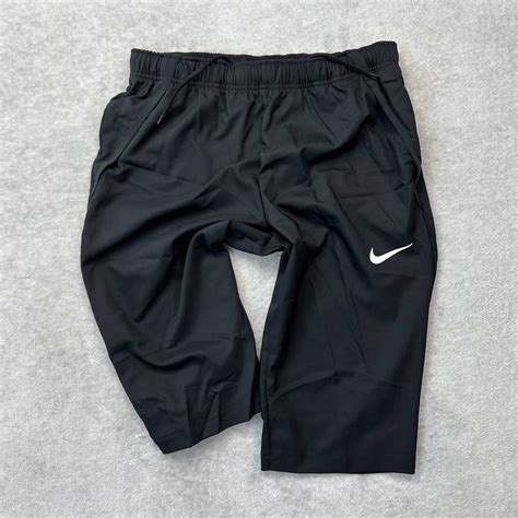 【未使用】【格安送料】新品未使用 Nike Xlサイズ ナイキ 7分丈 ウーブンパンツ ボトムス 34 トレーニング ジム スポーツ ブラック 黒 正規品の落札情報詳細 ヤフオク落札価格